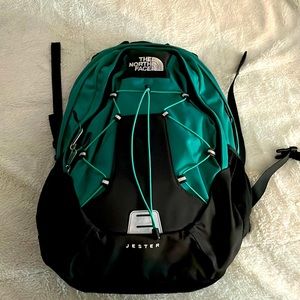 Dark green 2 pocket north face back pack